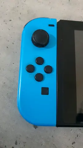 Nintendo Switch Console with Blue Joy-Con