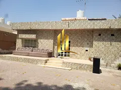 Residential Property for Sale in Al Mansoura on a 9,000 Sq.Ft. Plot with Long-Term Tenant