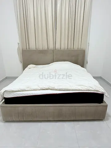 Beige Upholstered Queen Bed Frame with Headboard - Good Condition