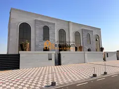 Luxury villa for sale in Mizair'ah; first-time occupancy, excellent price, and situated on a 36-