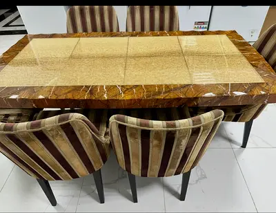 Dining  marble sets from marina home with seven chairs
