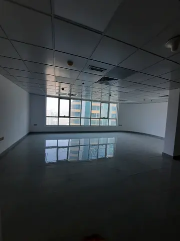 Semi-Partitioned Office for Annual Rent in Al Majaz 2 | 1800 sqft | Kitchen | 2 Bathrooms | Open view | 2 Free Parkings | Free AC