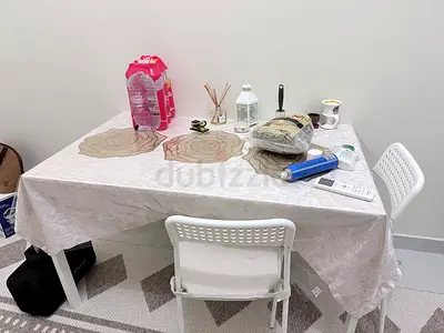 White rectangular dining table with 4 chairs - simple modern set
