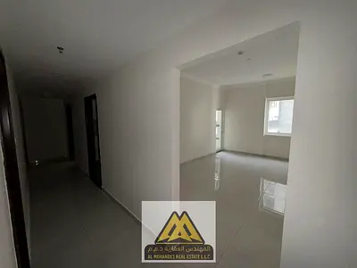 located directly on Sheikh Ammar Street in Al Jurf 2. This spacious one-bedroom apartment offers a large and practical layout with a balcony, two bat