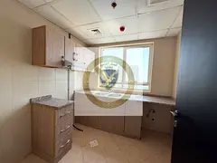 A one-bedroom apartment with a living room, featuring a full sea view on Al Majaz Corniche, located