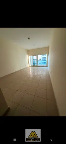 For sale: Two-bedroom apartments in Ajman One Towers, 1,750 sq.ft., 3 bathrooms, balcony. Total price: AED 820,000. AED 320,000 paid, balance through