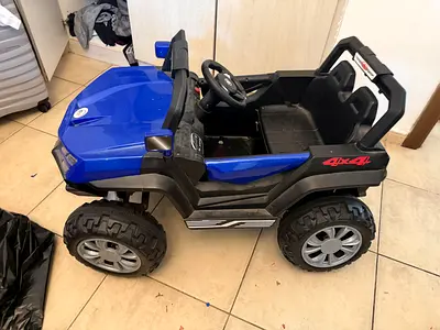 Blue 4x4 Electric Ride-On Toy Car for Kids — Good Condition