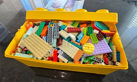 Mixed Lego building bricks set (6 sets) in yellow storage tray (used)