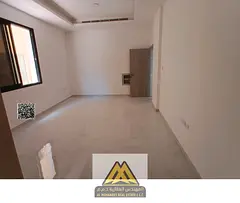 First-occupant studio in Al Alia, prime location near services, spacious layout, separate kitchen, h