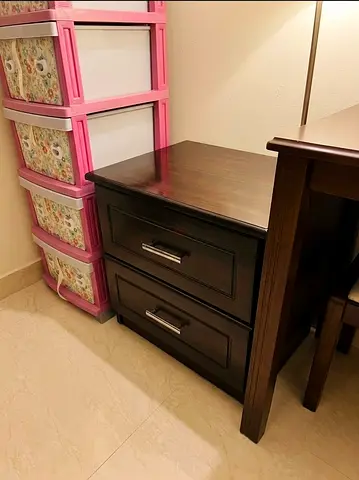 Dark wood two-drawer bedside/side table in good condition