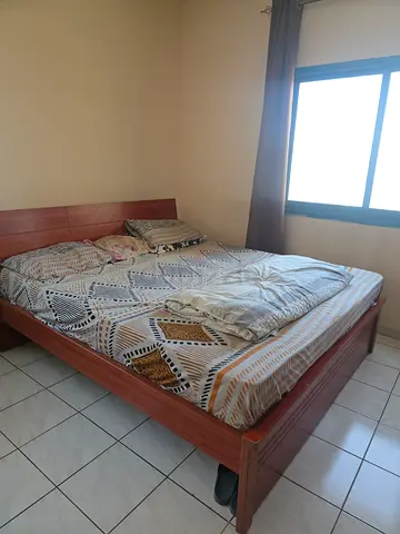 Queen wooden bed frame with mattress - good condition