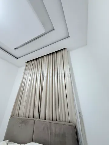 Beige fabric curtains with blackout lining - gently used
