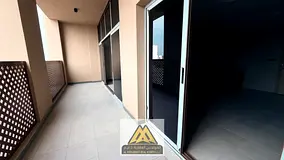 The most beautiful and largest 3-bedroom apartment with a living room on Ajman Corniche, featuring a