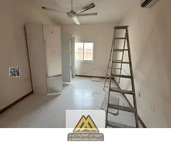One-bedroom apartment in Al Rawda 3, Ajman, master bedroom, two bathrooms, closed kitchen, split A/C