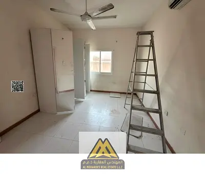 One-bedroom apartment in Al Rawda 3, Ajman, master bedroom, two bathrooms, closed kitchen, split A/C, parking available, close to all services, AED 25