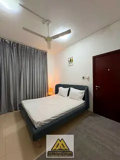 Strategically located in the heart of Ajman within the prominent "City Towers" complex, on