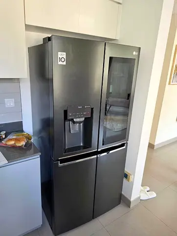 LG Black Stainless French Door Refrigerator with Water Dispenser (Good Condition)