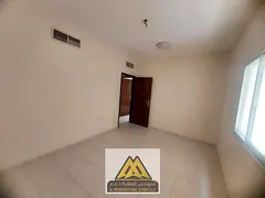 Annual rent: 2BR apartment with separate living room, balcony, 2 bathrooms, central A/C, free mainte
