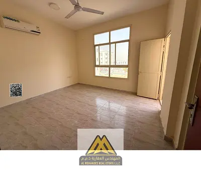 One bedroom apartment Al Alia balcony two bathrooms split AC spacious 28000 four payments close services