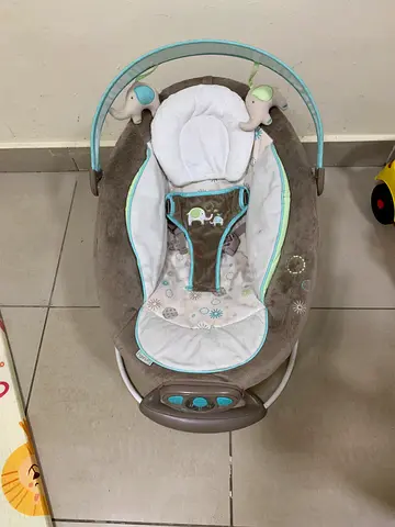 Baby rocker/bouncer seat with toy bar - good used condition