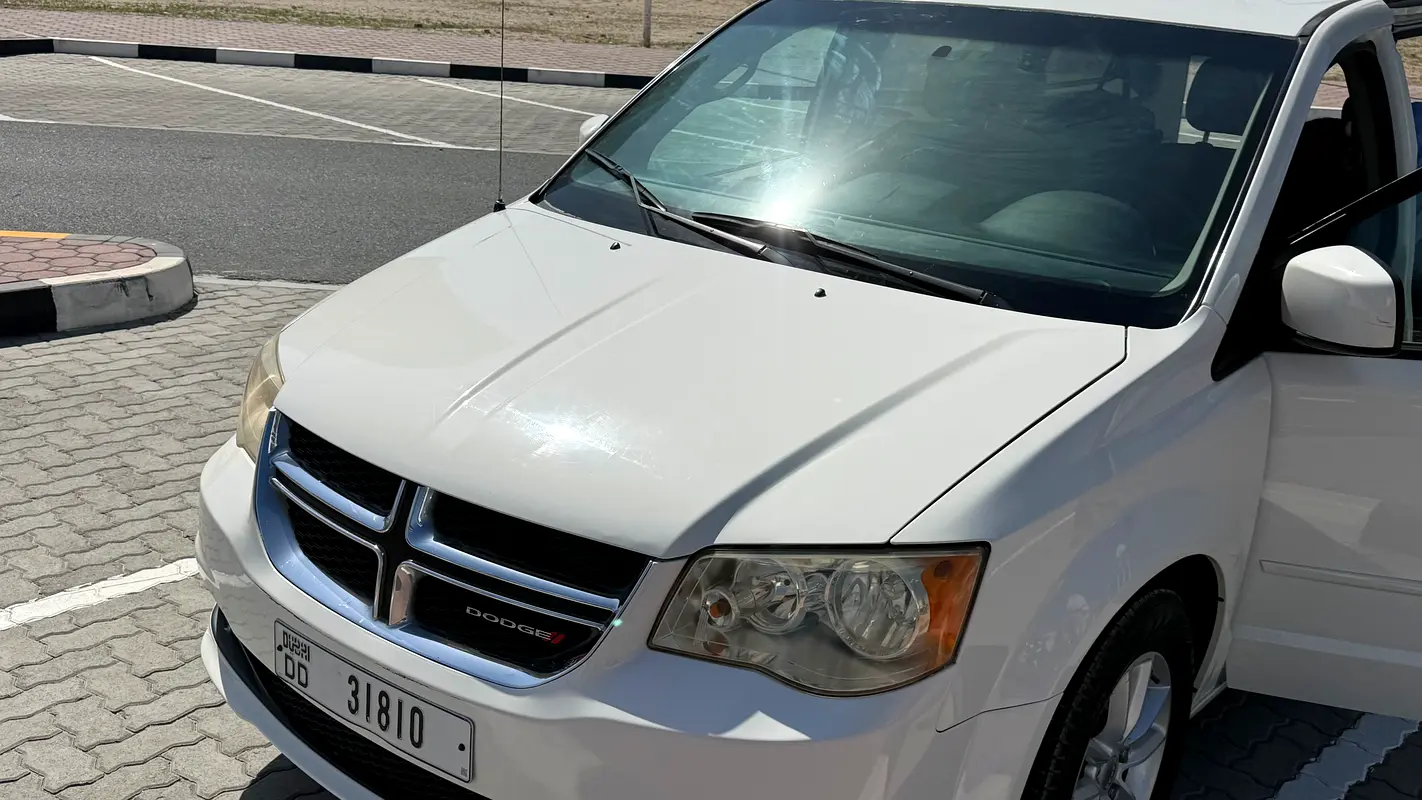 Dodge Caravan 2013 — photo 1 of 13