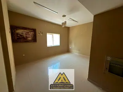 A spacious 2-bedroom apartment is available for annual rent in Al Nuaimiya 2