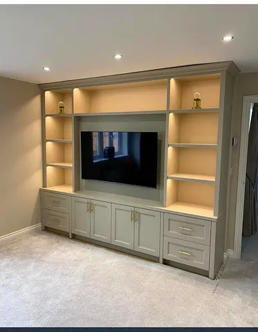 Modern Entertainment Center with Integrated Shelving and Cabinetry
