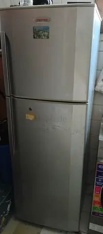 Silver top-freezer refrigerator - good working condition