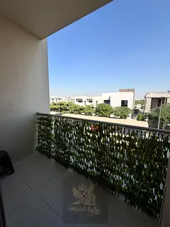 Spacious one-bedroom apartment with a living room in the Hadaeq Al Zahia area.