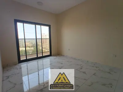 Two-bedroom apartment in Al Rawda 1, 3 bathrooms, central AC, AED 40,000 yearly, 4 installments, prime location.