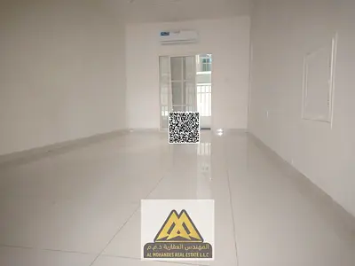 A distinctive apartment with a balcony and open views in the heart of Al Rawda 3, offering comfortable living space and a vibrant location