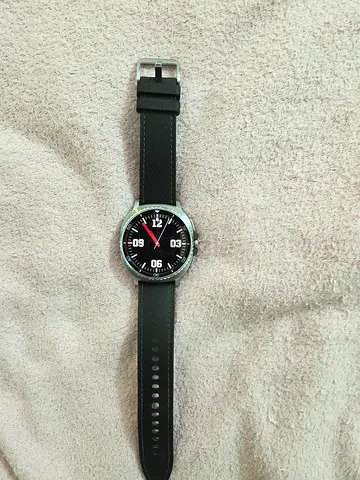 Samsung Galaxy Watch (classic round smart watch) with leather strap