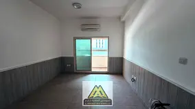 A spacious bedroom and living room, a balcony with a stunning open view, split air conditioning thro