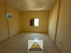 Studio in Al Rashidiya 2, large space, semi-separate kitchen, central AC. AED 18K yearly, 4 payments