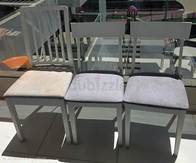 Set of 3 simple white wooden dining chairs with cushions