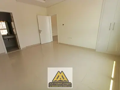 2-bedroom apartment in Al Mowaihat 3 with balcony, panoramic view, and new finishing. AED 50K yearly, 4 payments, near Dubai exit, spacious layout, pr