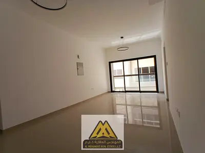 A brand-new one-bedroom apartment is available for annual rent in Al Jurf 3, Ajman. This first-occupancy unit features modern finishing, a balcony, tw