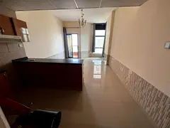 Private parking – Balcony overlooking Sheikh Khalifa Bin Zayed – Open American kitchen – Centr