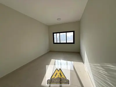 One-bedroom apartment with living room in Al Jurf 3, Ajman. Closed living room, one bathroom, central AC, no balcony, close to Dubai exit. AED 31,000