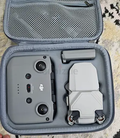 DJI Mini 4K drone with controller and case (3 batteries included) and accessories