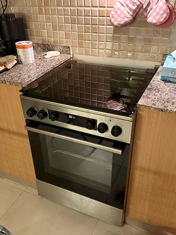 Gas stove with electric oven