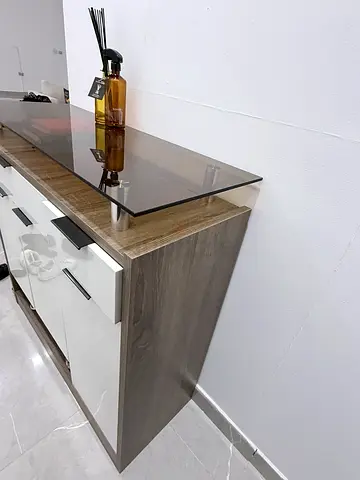 Compact modern storage cabinet with drawers and doors