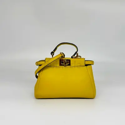 Small yellow leather handbag / shoulder bag - preowned
