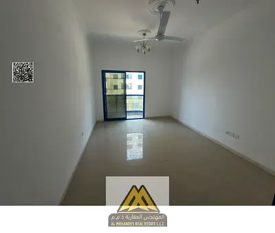 1 bedroom hall in Ajman Industrial 2, balcony, central AC, AED 30k, 4 or 6 payments, prime location.