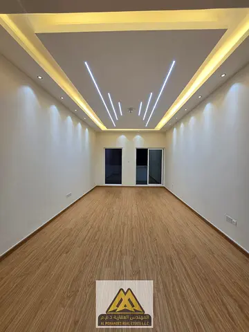 Spacious one-bedroom apartment in Ajman One Towers, Al Rashidiya 3, with 1300 sq ft area, master bedroom, 2 bathrooms, large balcony, park view, and f