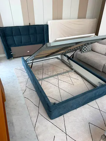 Al Huzaifa Upholstered Storage Bed with Mattress