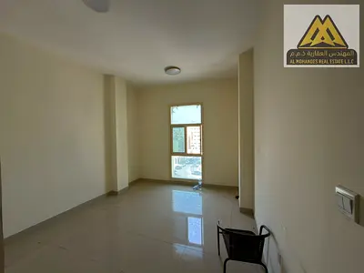One bedroom and living room with a balcony offering an open view of Ajman Corniche, second row, close to all services and main roads.