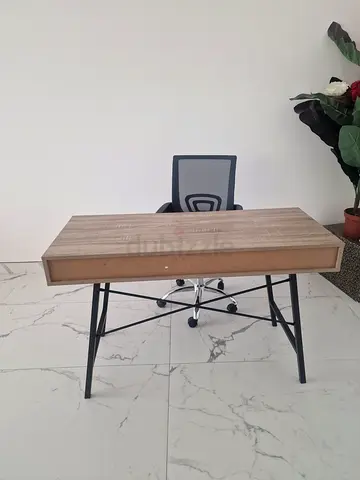 Compact wooden study desk with metal legs and office chair. Excellent condition