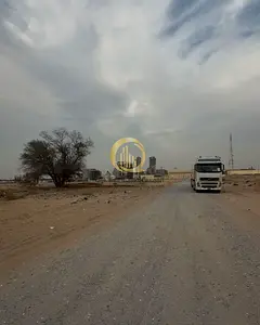 For sale: land in Al Malha, Al Rawidat Suburb, area of 3,261 sq ft on a 24-meter street, ground +4