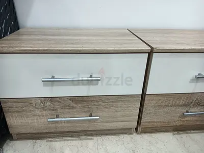 Pair of modern 2-drawer bedside tables in oak finish